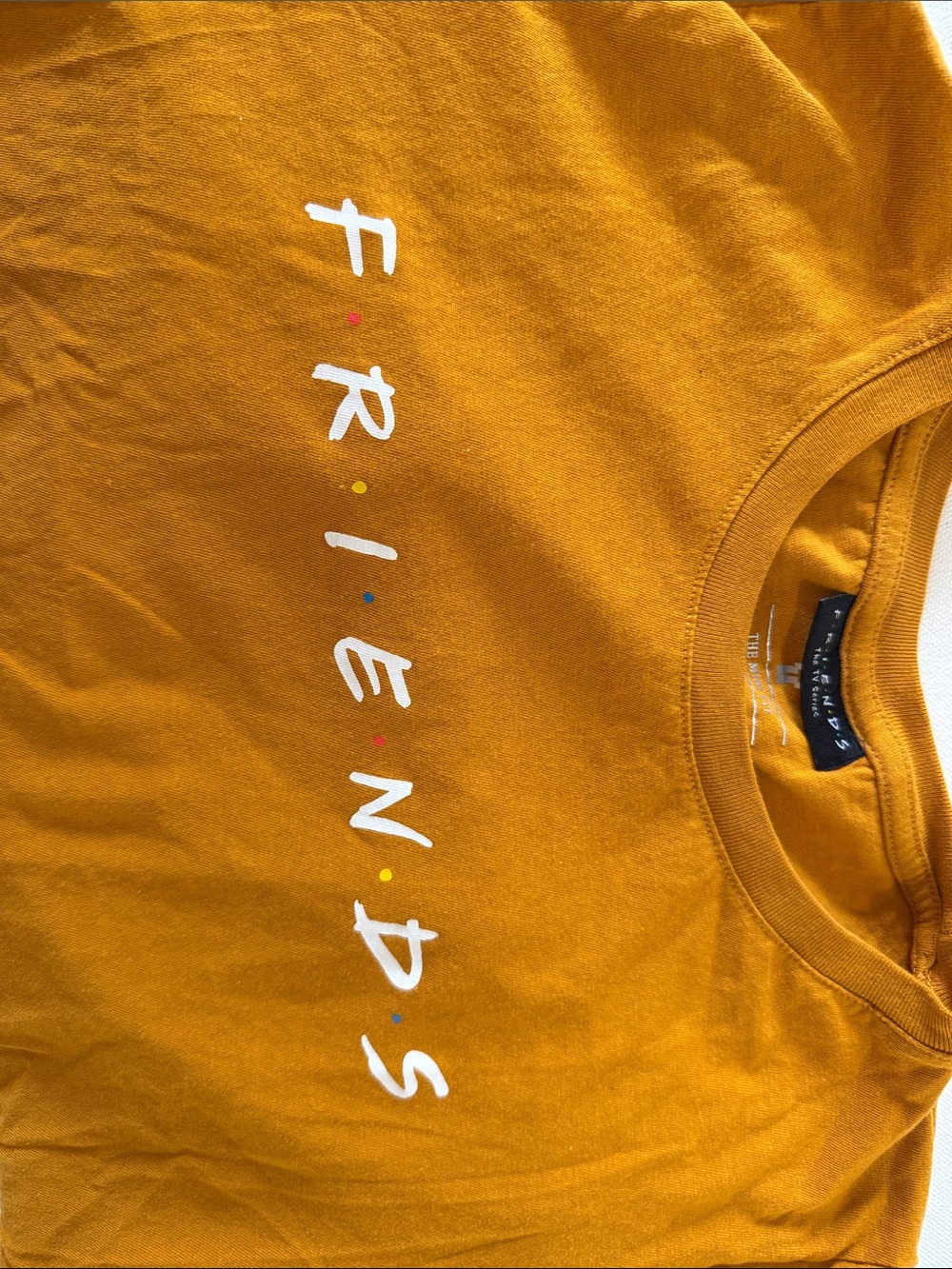 NWOT FRIENDS Logo Graphic Tee - Mustard Yellow